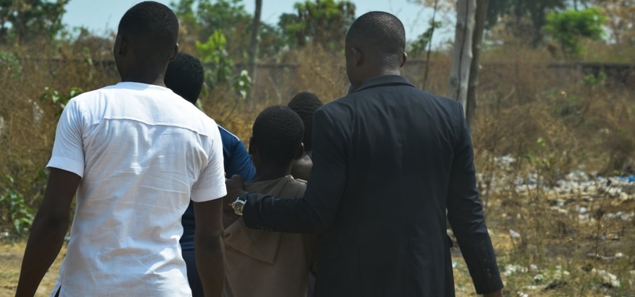 01 31 A victim being escorted by partners