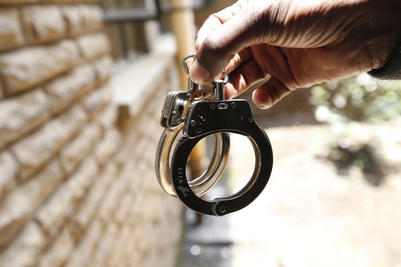 Handcuffs 2021 10 Kenya stock photoshoots Monica Mwangi Full Use 2